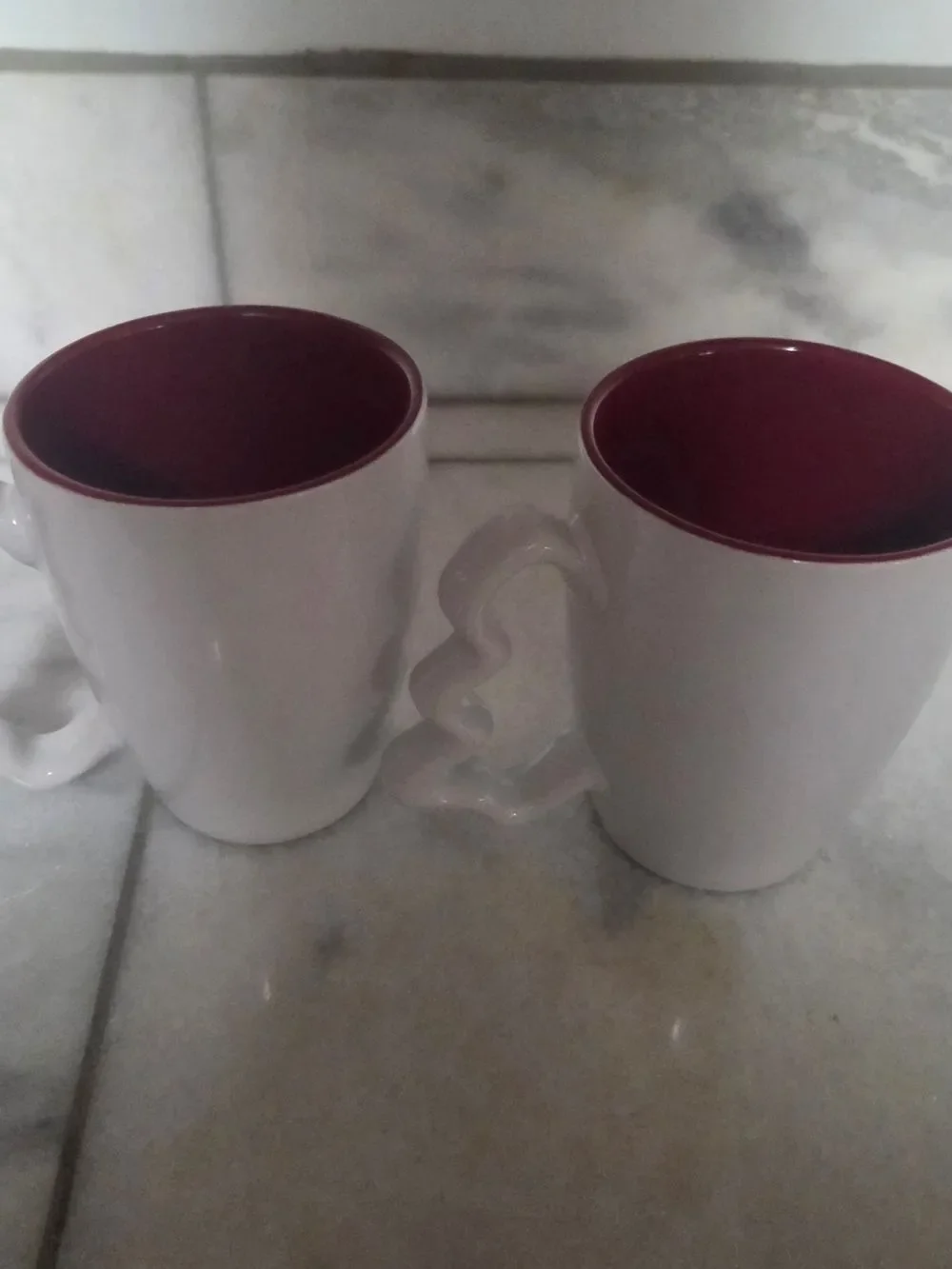 Festive White Ceramic Mugs with Red Interior and Reindeer Print, Set Of 2